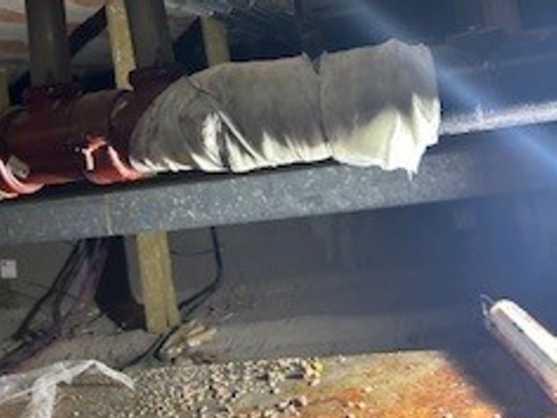 SylWrap HD Pipe Repair Bandage used to seal a hole in a cast iron drain pipe at a UK hospital